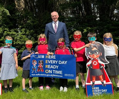 1) Jonathan Price, Staffordshire County Council Cabinet Member for Education with pupils from Pirehill Primary School in Staffor