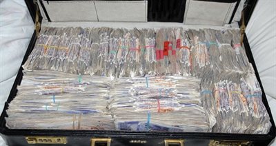 cash in briefcase May 2021