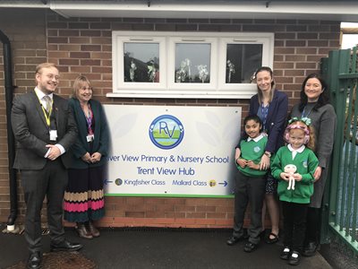 Alex Hunt with staff and pupils