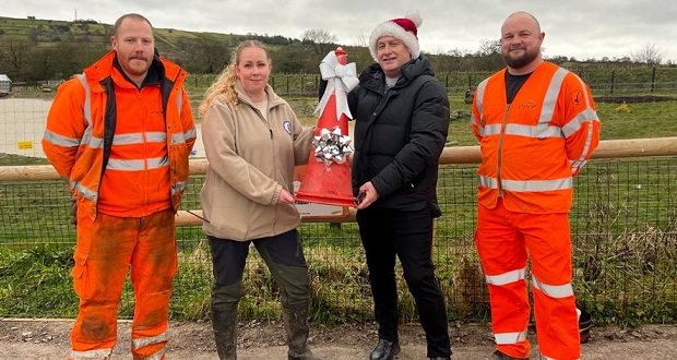 Snow much fun: Polar bears are treated to their favourite toys by highways crews this Christmas