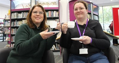 Victoria Wilson, pictured left, at Newcastle Library in October 2022 with volunteer Stephanie.