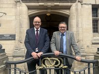 Photo of Cllr Nigel Yates and Cllr Andrew Mynors outside of County Buildings in Stafford