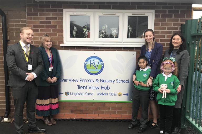 Alex Hunt with staff and pupils