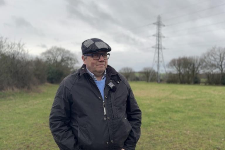 Image shows Andrew Mynors in a field.