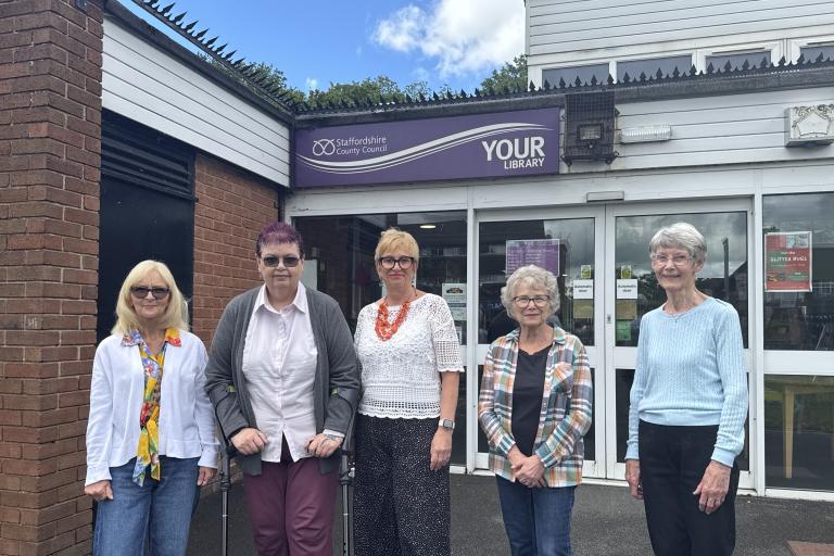 Volunteers outside Holmcroft Community Library