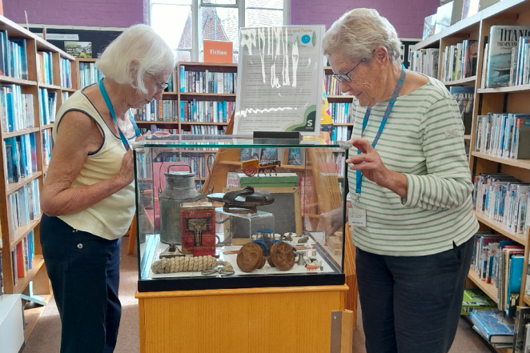 Volunteers with exhibition display in Kinver Library