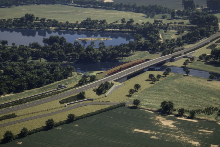 An artist's impression of a new bridge over a river. It is a sweeping shot showing how the bridge looks in context with a green landscape, road and sparkling river featured in the image.