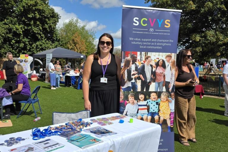 Stalls at family fun day including one for youth services