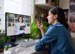 Image of a woman talking in an online meeting