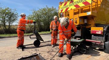 Highways crew fixing a pothole