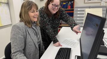 Hayley Coles reviewing records at Staffordshire History Centre