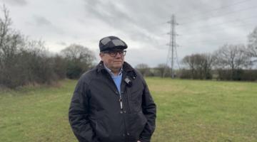 Image shows Andrew Mynors in a field.
