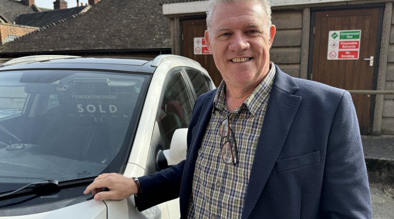 Tony Screen with car with sold sign