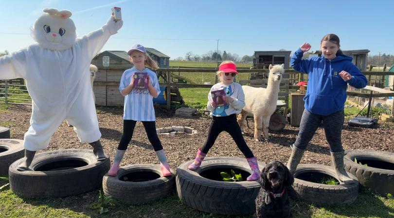 easter at farm with children and easter bunn