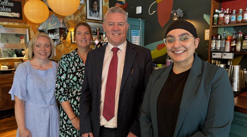 Anthony Screen with domestic abuse support providers in bistro setting