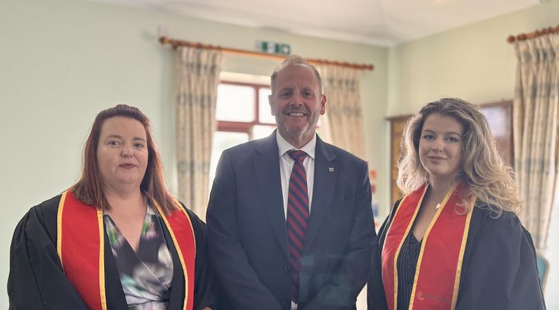 Robin Hall with apprenticeship graduates
