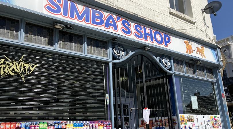 front of Simba's shop, which has been closed