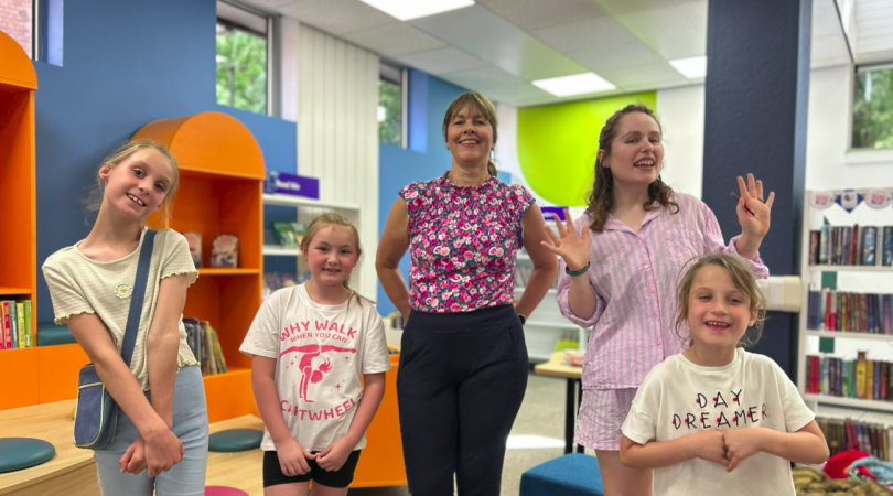 Hayley Coles with children inside Tamworth Library