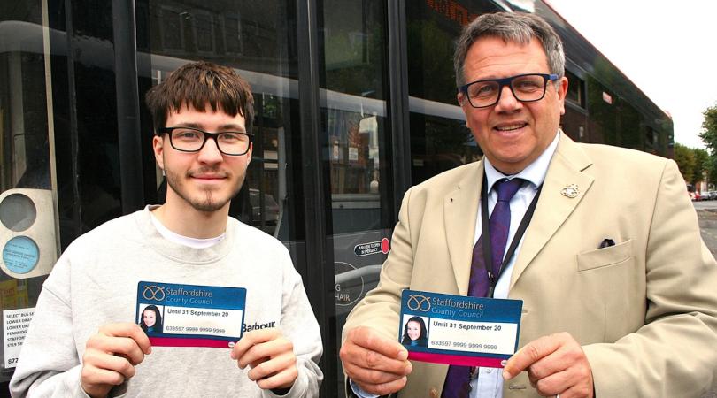 Care leaver Owen with Andrew Mynors holding bus passes