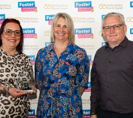 Two special guardians being presented with their award